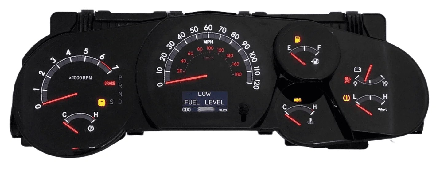 Automotive instrument gauge cluster with illuminated warning lights, an example of the electronics serviced by Tanin Auto Electronix in Caledonia, Wisconsin
